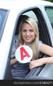 Blond teenage learner driver