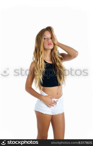 Blond teenager girl touching hair on white background