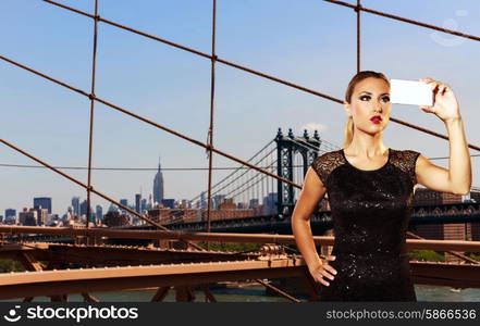 Blond tourist girl selfie photo in Brooklyn bridge New York Photomount