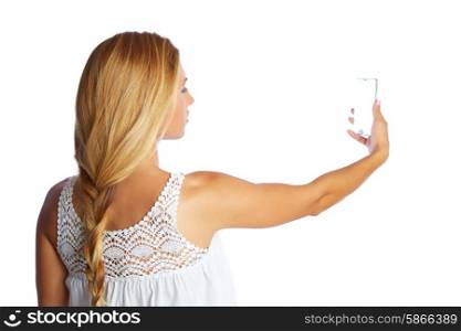 Blond tourist girl taking photos with smartphone on white background and braid