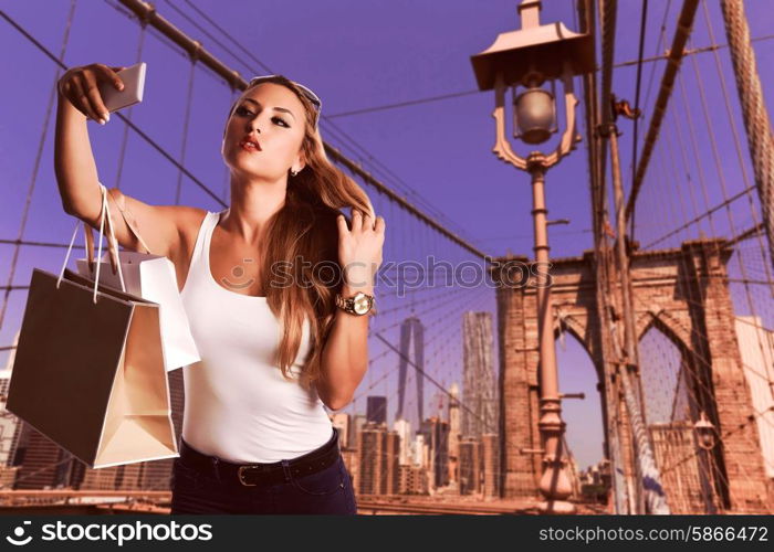 Blond tourist selfie photo in Brooklyn bridge New York photomount