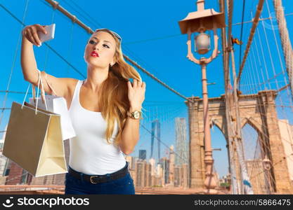 Blond tourist selfie photo in Brooklyn bridge New York photomount