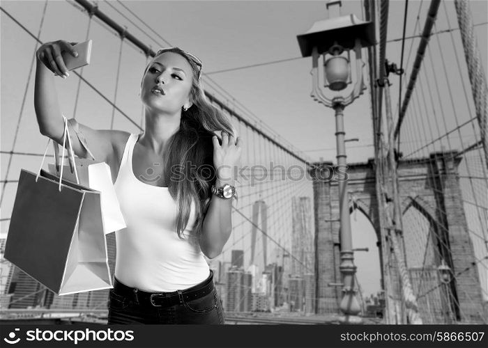 Blond tourist selfie photo in Brooklyn bridge New York photomount
