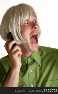 Blond wig on excited man on cell phone