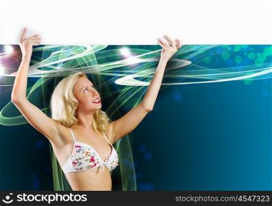 Blond with banner. Young girl in bikini with white blank banner