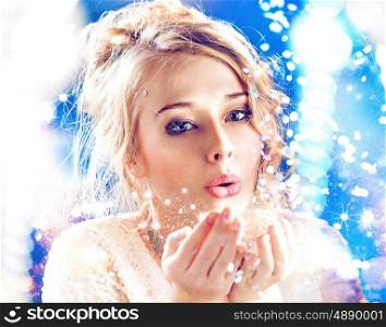 Blond woman blowing a magic dust