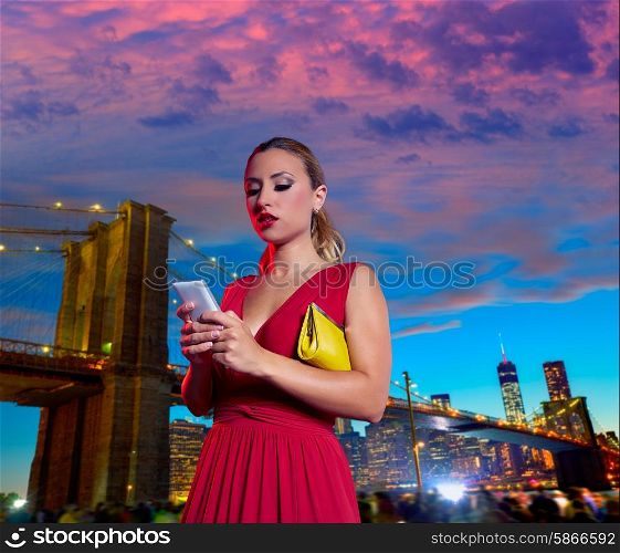 Blond woman chat writing smartphone in Brooklyn Bridge New York at night Photomount