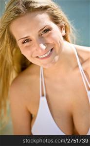 Blond woman enjoy summer sun on beach