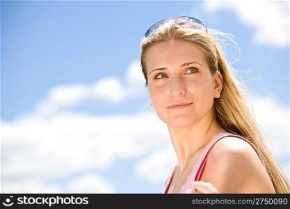 Blond woman enjoy summer sun with sunglasses