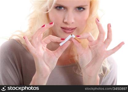 Blond woman giving up smoking
