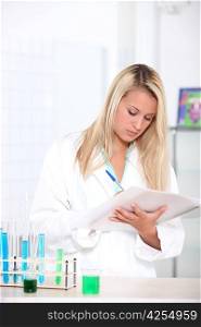 Blond woman in science laboratory