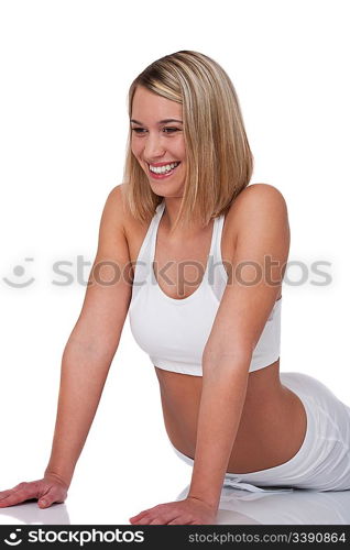 Blond woman in sportive outfit on white background