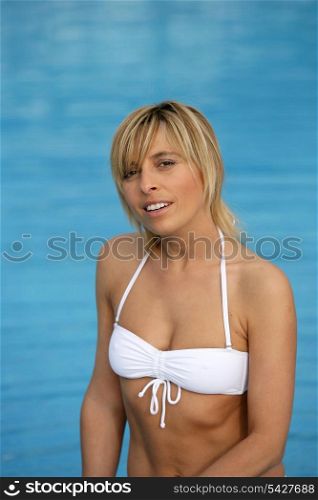 Blond woman in white bikini