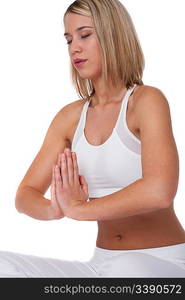 Blond woman in yoga position on white background