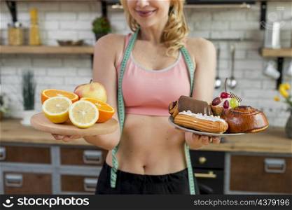blond woman kitchen with fruits
