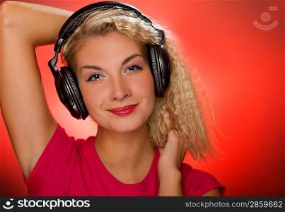 Blond woman listening to the music