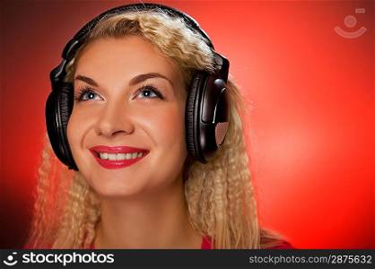 Blond woman listening to the music