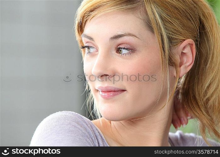 Blond woman looking sideways