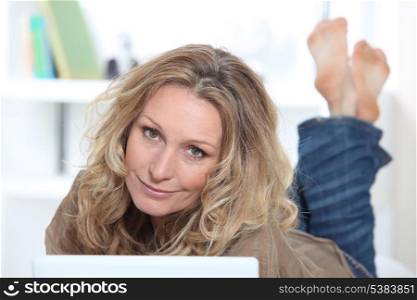 Blond woman on laptop