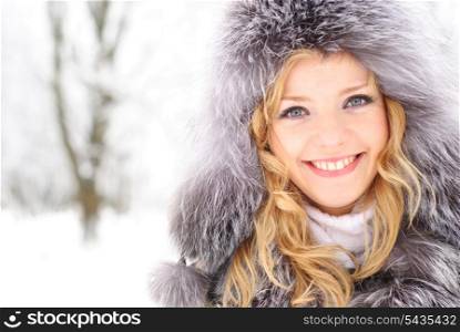 Blond woman outdoors in winter day