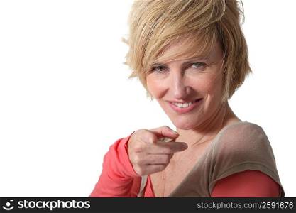 Blond woman pointing