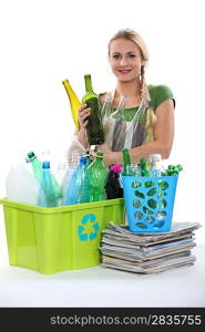 Blond woman recycling