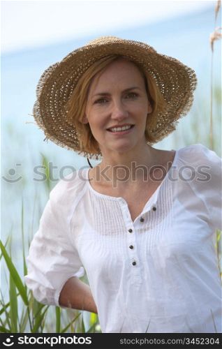 Blond woman with hat