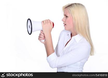 Blond woman with megaphone