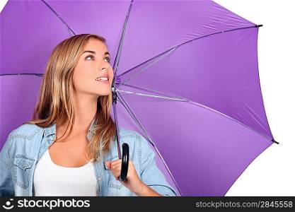 Blond woman with purple umbrella open