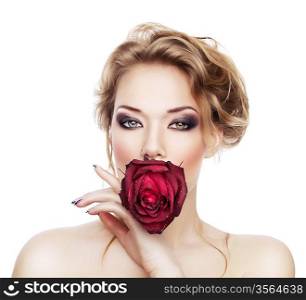 blond woman with red rose in mouth on white background