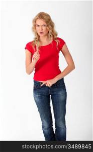 Blond woman with red shirt doing negative sign