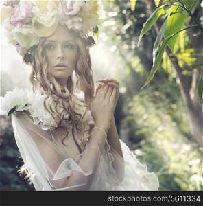 Blond woman with the fancy flower hat