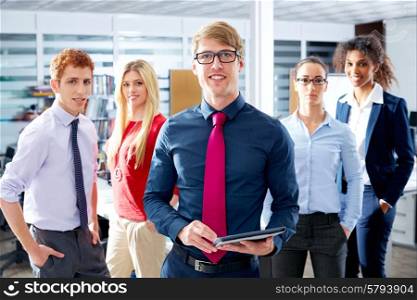 Blond young businessman multi ethnic teamwork group as leader in office