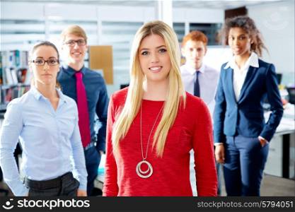 Blond young businesswoman multi ethnic teamwork group as leader in office