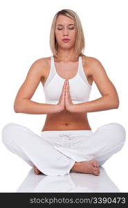 Blond young woman in yoga position on white background