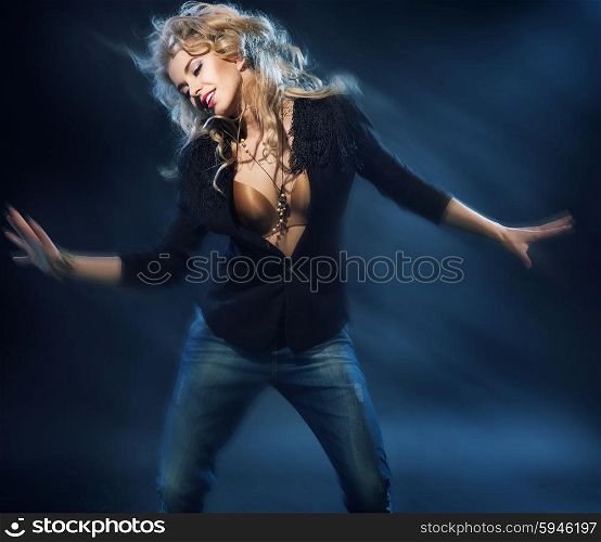 Blonde attractive lady on the dance floor