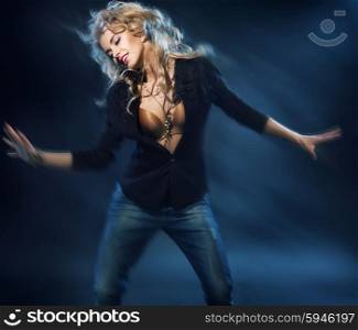 Blonde attractive lady on the dance floor