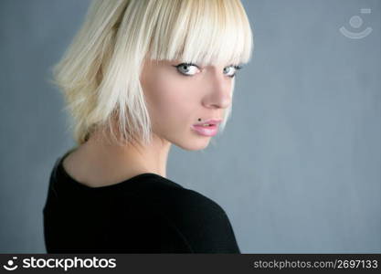 blonde beautiful fashion girl gray background