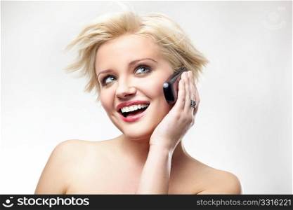 Blonde beauty speaking the phone