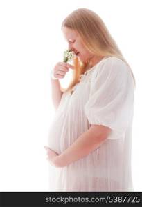 Blonde caucasian pregnant woman with snowdrops isolated on white
