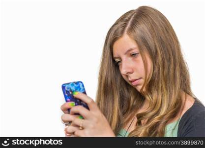 Blonde caucasian teenage girl calling with mobile telephone