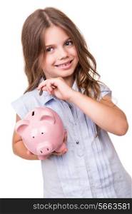 Blonde cute girl holding pink piggy bank