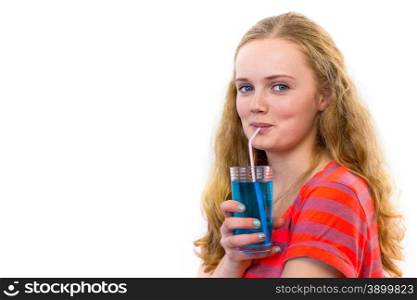 Blonde european teenage girl drinking blue soft drink with straw isolated on white background