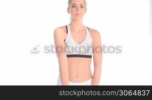 blonde fitness woman lifting weights