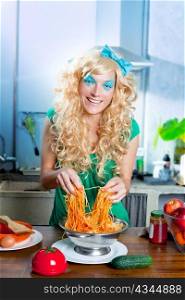 Blonde funny on kitchen with pasta and fashion blue makeup