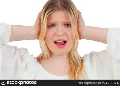 Blonde girl covering her ears isolated on a white background