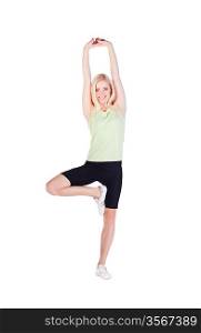blonde girl doing her exercise in heron pose on white background
