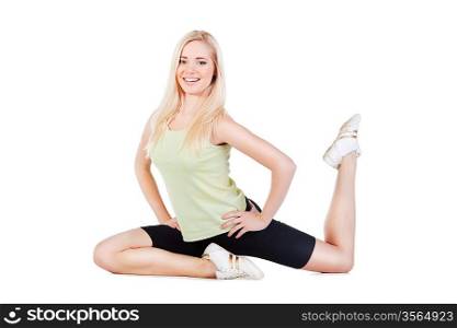 blonde girl doing her exercise on the floor on white background