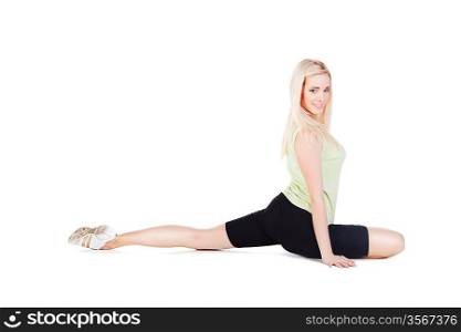 blonde girl doing her stretching exercise on white background