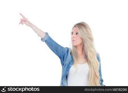 Blonde girl indicating something isolated on a white background